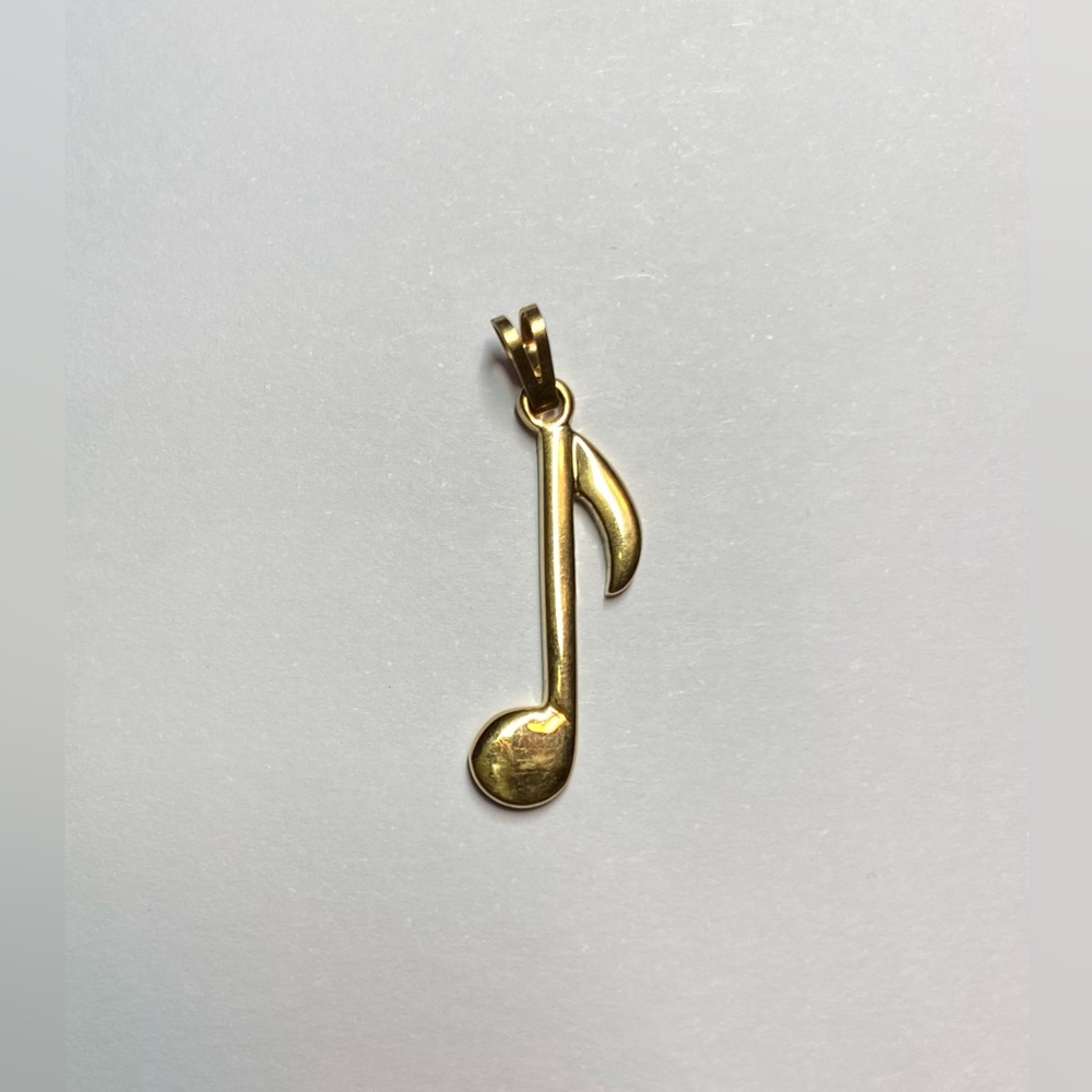 Vintage Monet gold metal musical note charm or pendant